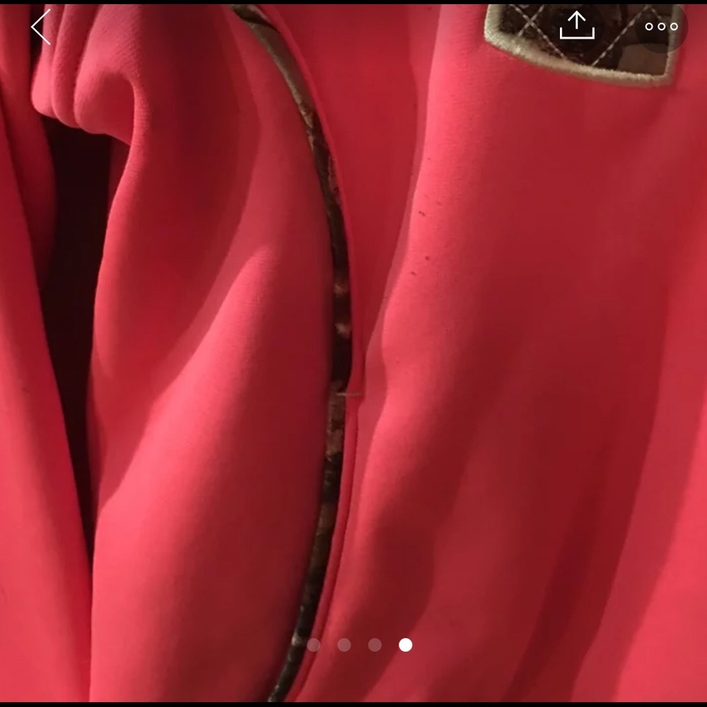 Under Armour pink and camouflage hoodie.